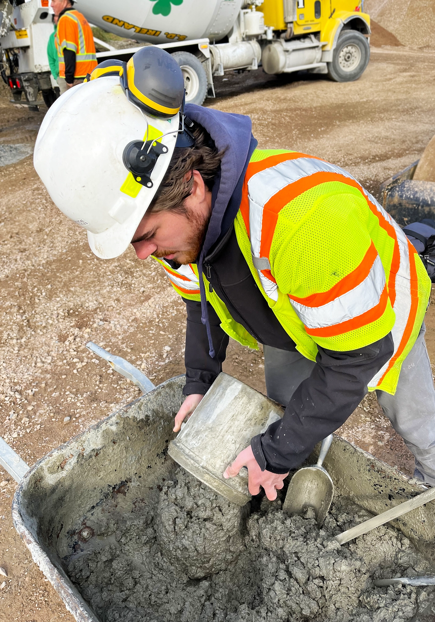 EIV employee N. Bartuce mixing concrete in Richmond, VT in Nov 2023